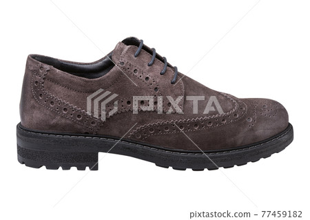 brown fashionable men's suede shoe with patterns, located horizontally, on a white background brown fashionable men's suede shoe with patterns, located horizontally, on a white background 77459182