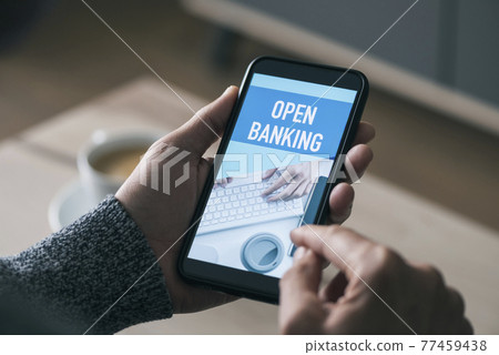 has smartphone with text open banking in screen has smartphone with text open banking in screen 77459438