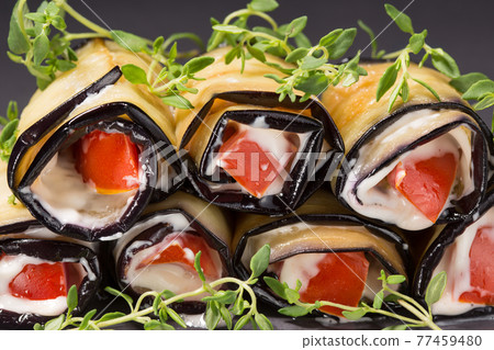 rolls of fried eggplant with garlic sauce and tomato rolls of fried eggplant with garlic sauce and tomato 77459480