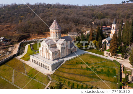 View from drone of Bodbe Monastery on hill slope in spring View from drone of Bodbe Monastery on hill slope in spring 77461850