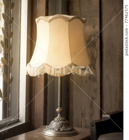 Old classic lamp, vintage lamp on the table. 77462575