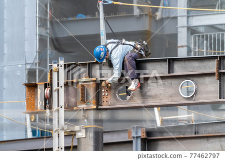 Construction site steel frame construction aerial work Construction site steel frame construction aerial work 77462797