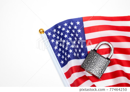 Padlock and US flag. The political concept of closed borders Padlock and US flag. The political concept of closed borders 77464250