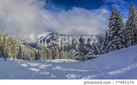 Ski slope in clear weather 77465174