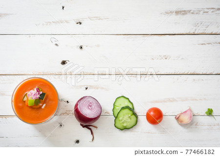 Gazpacho soup in glass on wooden table 77466182