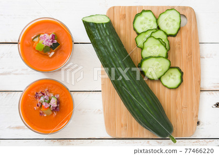 Gazpacho soup in glass on wooden table 77466220