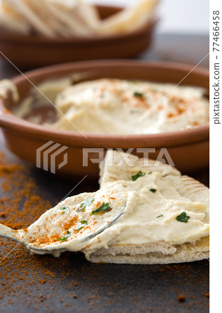 Hummus on black stone Hummus on black stone 77466458
