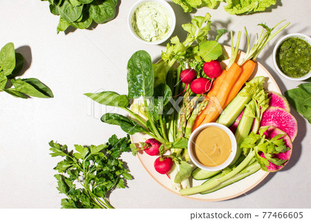 Fresh vegetable snack with healthy vegan dips 77466605