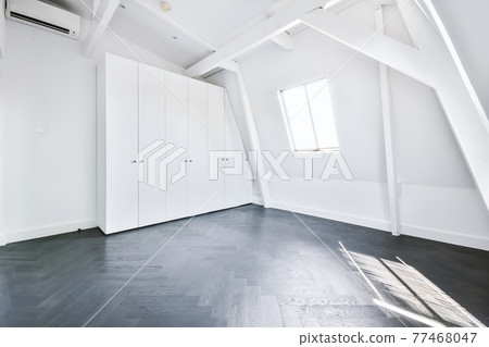 Interior of empty room with white walls Interior of empty room with white walls 77468047
