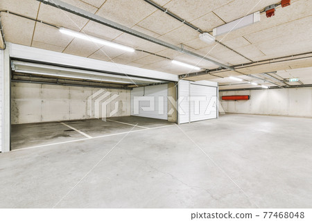 Interior of underground parking lot Interior of underground parking lot 77468048