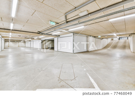 Interior of underground parking lot Interior of underground parking lot 77468049