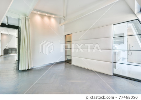 Interior of empty room with white walls Interior of empty room with white walls 77468050