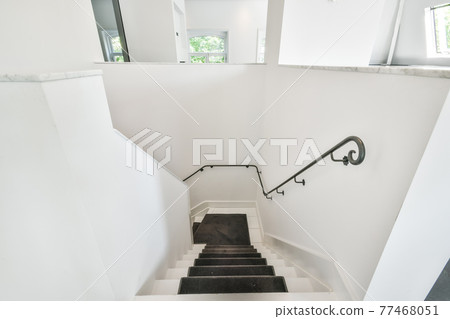 Staircase in modern house in minimal style Staircase in modern house in minimal style 77468051