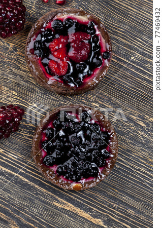 dessert of baked tartlets 77469432