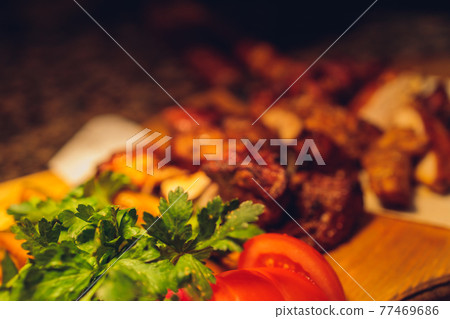 traditional Georgian lula kebab with three types sauce - ketchup, green tkemali, mayonnaise. Selective focused. 77469686
