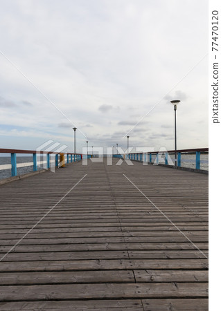 a long pier on the territory of the sea a long pier on the territory of the sea 77470120