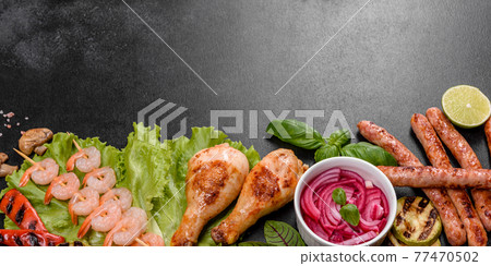 Composition of sausages, chicken, pork and shrimp prepared on grill, as well as vegetables prepared on grill with spices and herbs Composition of sausages, chicken, pork and shrimp prepared on grill, as well as vegetables prepared on grill with spices and herbs 77470502