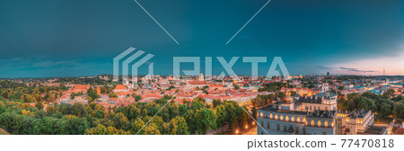 Vilnius, Lithuania, Eastern Europe. Historic Center Cityscape In Blue Hour After Sunset. Travel Panorama Of Old Town In Night Illuminations. UNESCO. Palace Of Grand Dukes Of Lithuania. Vilnius, Lithuania, Eastern Europe. Historic Center Cityscape In Blue Hour After Sunset. Travel Panorama Of Old Town In Night Illuminations. UNESCO. Palace Of Grand Dukes Of Lithuania. 77470818