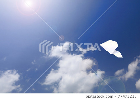 Paper plane flying in the sky 77473213