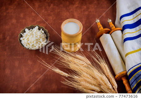 Shavuot kosher food fresh dairy products milk, cottage cheese wheat Shavuot kosher food fresh dairy products milk, cottage cheese wheat 77473616
