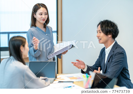 Business men and women office 3 people 77473739