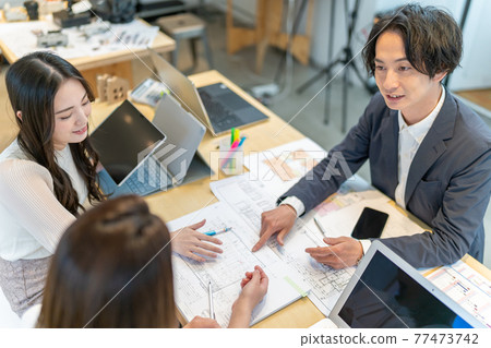 Business men and women office 3 people 77473742