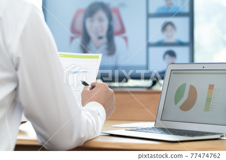 Men having an online meeting 77474762