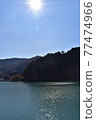 Sun halation and lake 77474966
