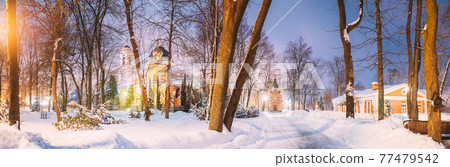 Gomel, Belarus. City Park In Winter Night. Peter And Paul Cathedral And Chapel-tomb Of Paskevich 1870-1889 Years . Rumyantsevs And Paskeviches Park. Famous Local Landmark In Snow. Panorama Gomel, Belarus. City Park In Winter Night. Peter And Paul Cathedral And Chapel-tomb Of Paskevich 1870-1889 Years . Rumyantsevs And Paskeviches Park. Famous Local Landmark In Snow. Panorama 77479542