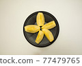 Apples on black porcelain 77479765