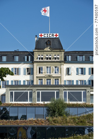 flag and building of the International Committee of Red Cross Headquarters (ICRC)( CICR) flag and building of the International Committee of Red Cross Headquarters (ICRC)( CICR) 77480597