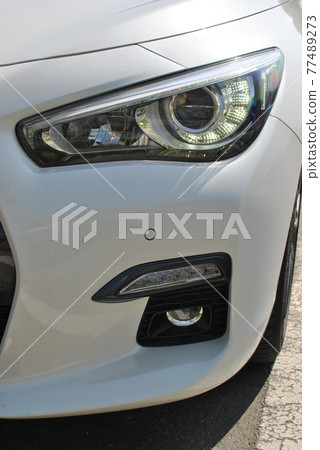 White sporty car White sporty car 77489273