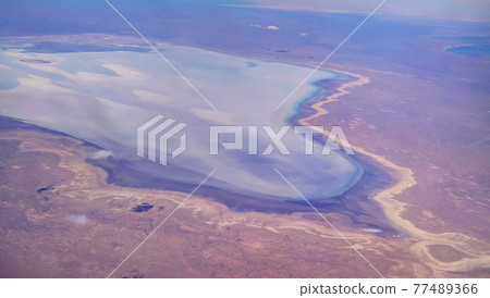 Aerial Panorama view to saline Barsa Kelmes lake and Ustyurt plateau at Karakalpakstan, Uzbekistan Aerial Panorama view to saline Barsa Kelmes lake and Ustyurt plateau at Karakalpakstan, Uzbekistan 77489366