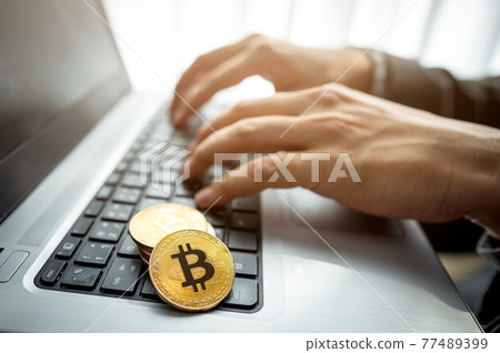 Businessman trading cryptocurrency Businessman trading cryptocurrency 77489399