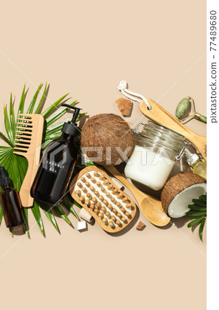 Spa coconut products flat lay, face, body and hair organic treatment concept Spa coconut products flat lay, face, body and hair organic treatment concept 77489680