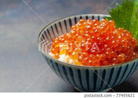 White rice with lots of fresh salmon roe White rice with lots of fresh salmon roe 77495621