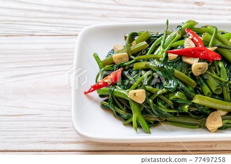 Stir-Fried Chinese Morning Glory or Water Spinach Stir-Fried Chinese Morning Glory or Water Spinach 77497258