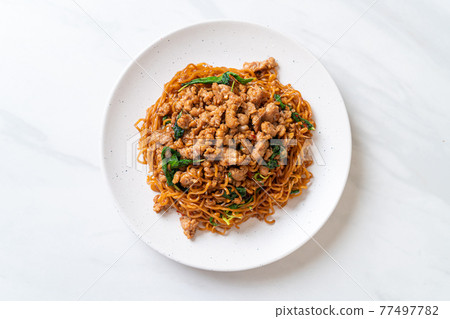 stir-fried instant noodles with Thai basil and minced pork stir-fried instant noodles with Thai basil and minced pork 77497782