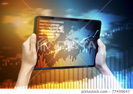 Close-up Of Business man's hand holding tablet showing stock market statistics gain profits and increase of chart positive indicators. Financial analysis, statistics. Concept of business strategy. Close-up Of Business man's hand holding tablet showing stock market statistics gain profits and increase of chart positive indicators. Financial analysis, statistics. Concept of business strategy. 77499647