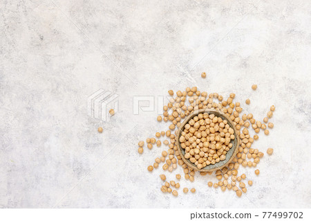 Bowl of raw dry chickpea Bowl of raw dry chickpea 77499702