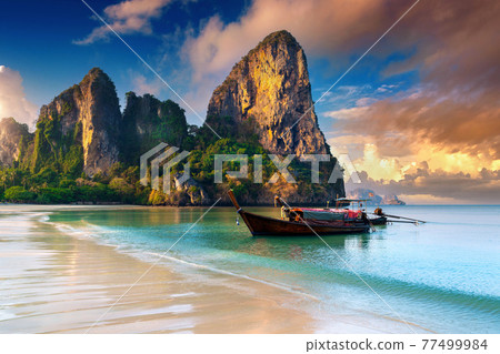 Railay beach at sunrise in Krabi, Thailand. 77499984