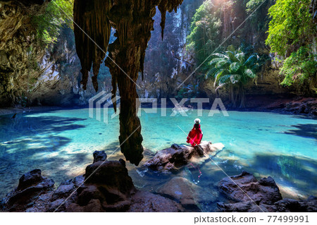 Woman enjoying in princess lagoon at Railay, Krabi in Thailand. Woman enjoying in princess lagoon at Railay, Krabi in Thailand. 77499991