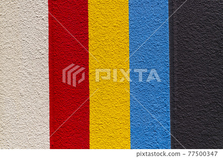 Beige, red, yellow, blue, black striped wall surface Beige, red, yellow, blue, black striped wall surface 77500347