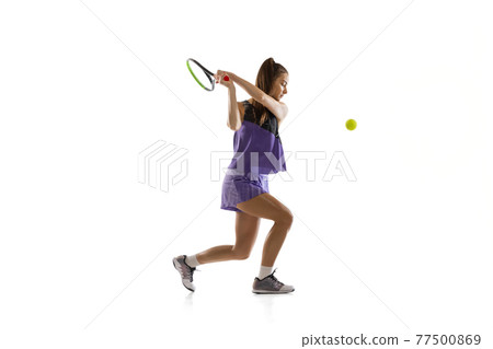 Young caucasian woman playing tennis isolated on white studio background in action and motion, sport concept 77500869