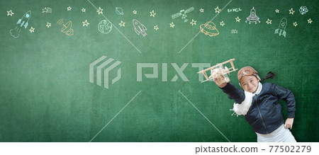 Kid in pilot costume and imagination dream in learning inspiration world in innovative science technology engineering maths STEM education and universal children's day concept Kid in pilot costume and imagination dream in learning inspiration world in innovative science technology engineering maths STEM education and universal children's day concept 77502279