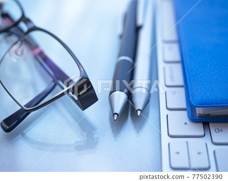 Business image · notebook · glasses · keyboard 77502390