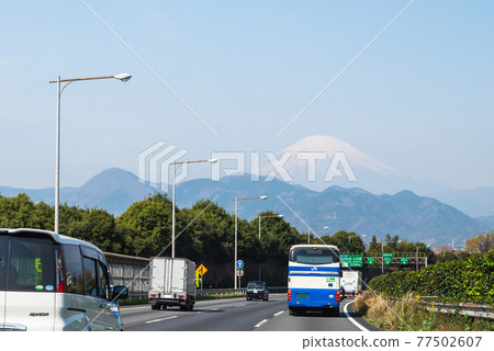 Car running on highway 77502607