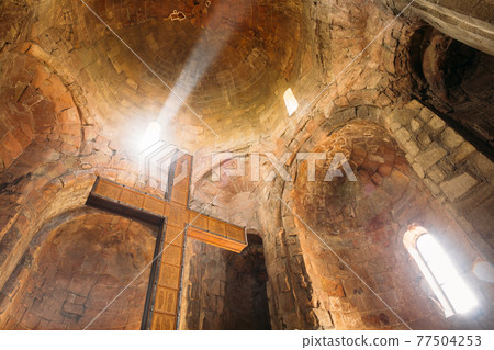 Mtskheta Georgia. Bottom View Of Big Wooden Cross On Stone Walls And Dome Background Of Jvari Church 77504253