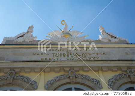 VIENNA, AUSTRIA - APR 30th, 2017: Statue of guardians at Gloriette in Schonbrunn palace in Vienna, Austria. Built in 1775 designed by architect Johann Ferdinand Hetzendorf von Hohenberg, clear sky VIENNA, AUSTRIA - APR 30th, 2017: Statue of guardians at Gloriette in Schonbrunn palace in Vienna, Austria. Built in 1775 designed by architect Johann Ferdinand Hetzendorf von Hohenberg, clear sky 77505952