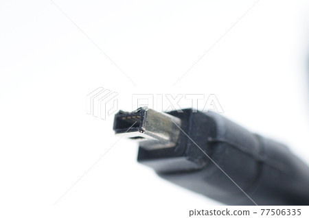Cable with 1394 and iLink plugs on white background Cable with 1394 and iLink plugs on white background 77506335